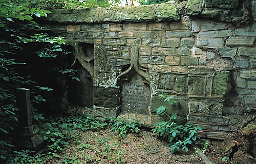 headstones set into wall