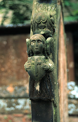 small angel with shield