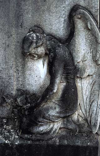 Kneeling angel - semi relief