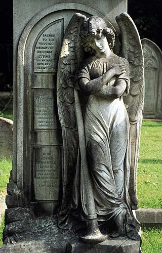 Angel, arms crossed with upturned horn